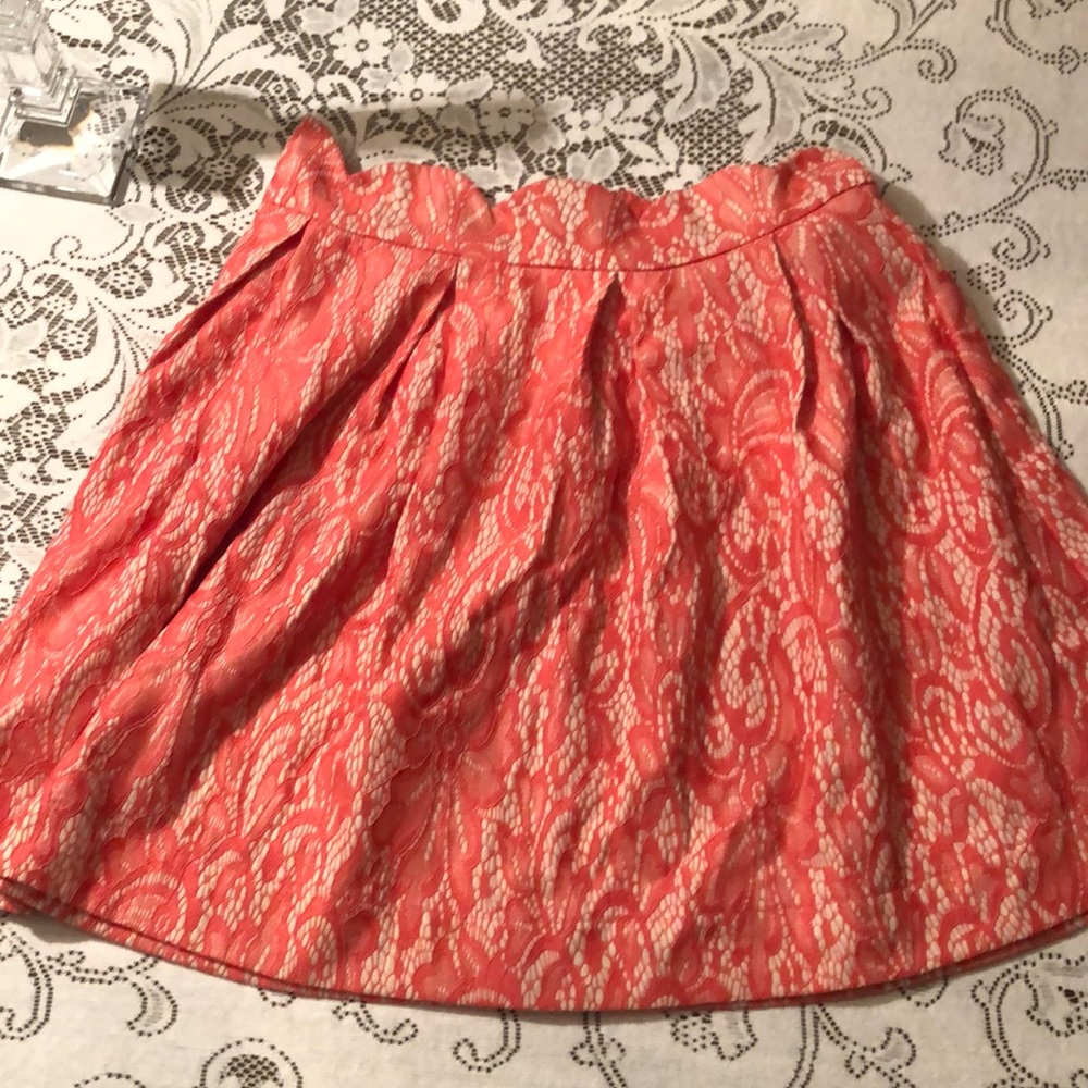 Tan skirt with bright pink lace overlay